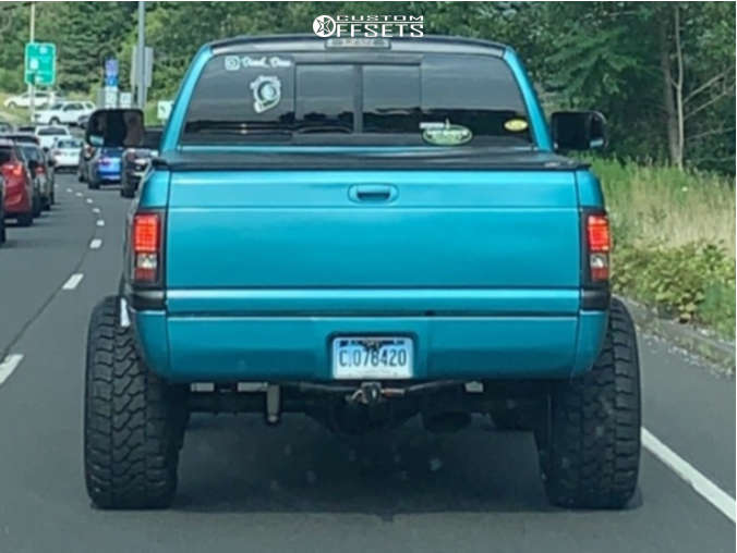 2001 Dodge Ram 2500 with 24x14 73 American Force Octane Ss and 35/13