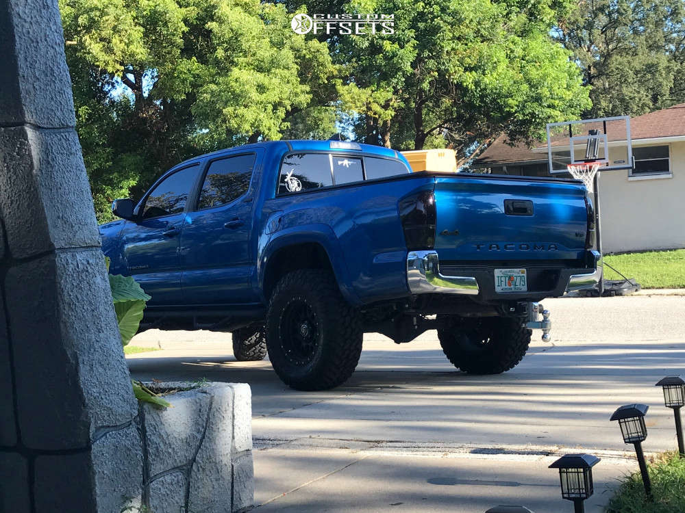 2017 Toyota with 17x8.5 Icon Alpha and 285/70R17 Nitto Trail