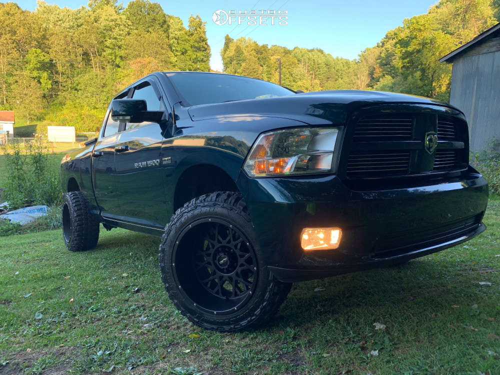 2011 Ram 1500 with 20x12 51 Vision Rocker and 33/12.5R20 Federal
