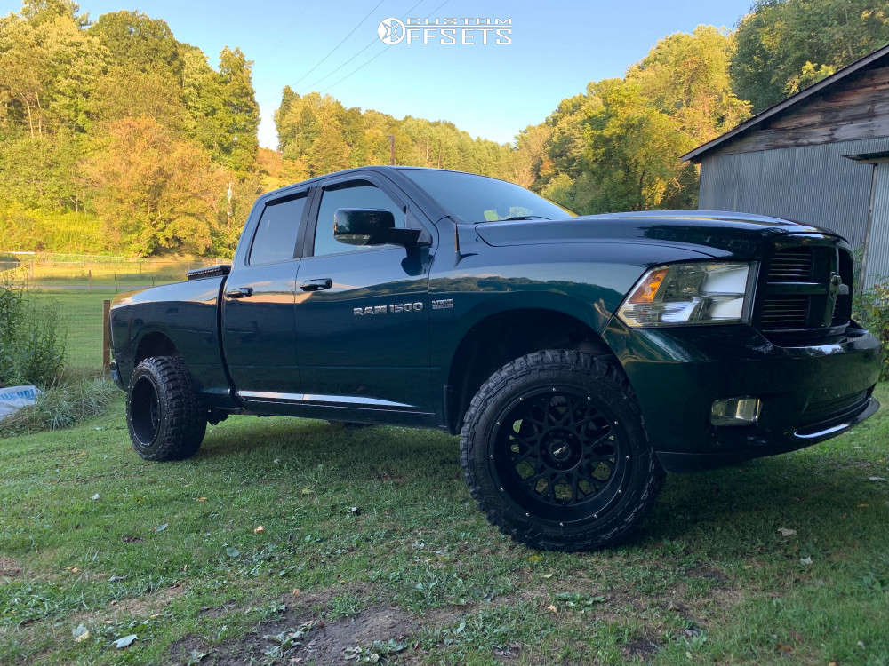 2011 Ram 1500 with 20x12 51 Vision Rocker and 33/12.5R20 Federal