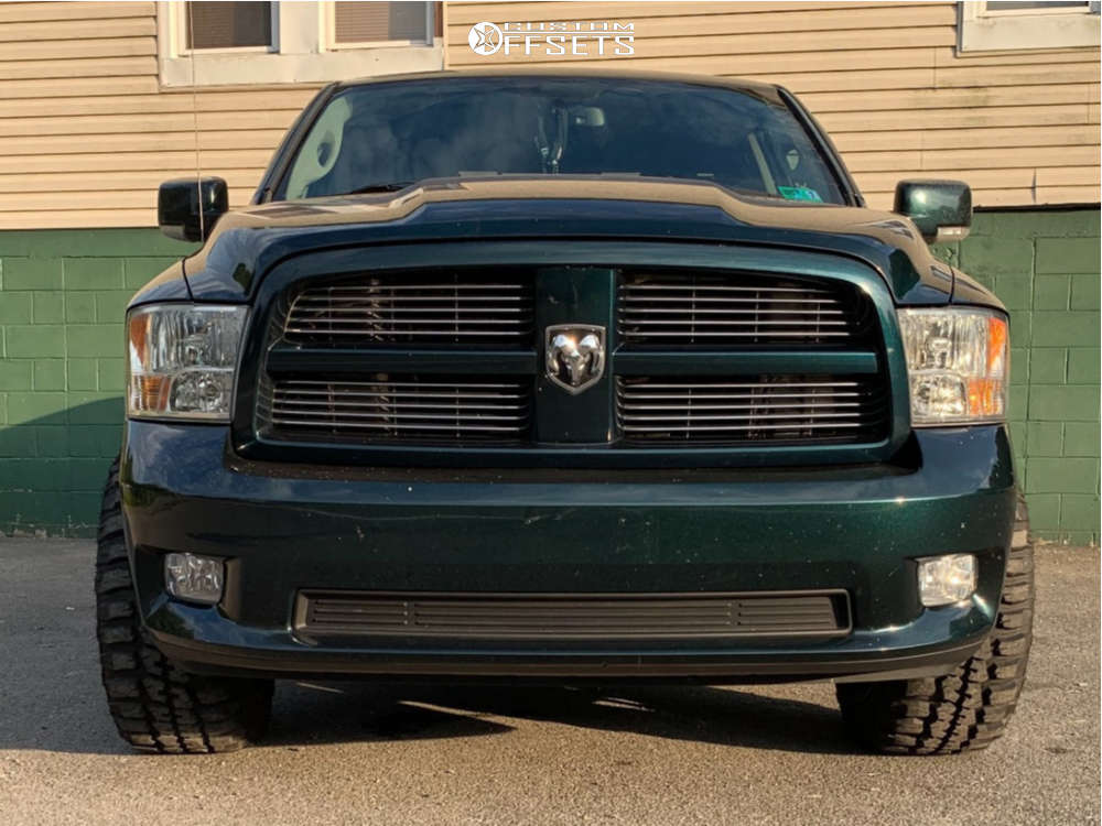 2011 Ram 1500 with 20x12 51 Vision Rocker and 33/12.5R20 Federal