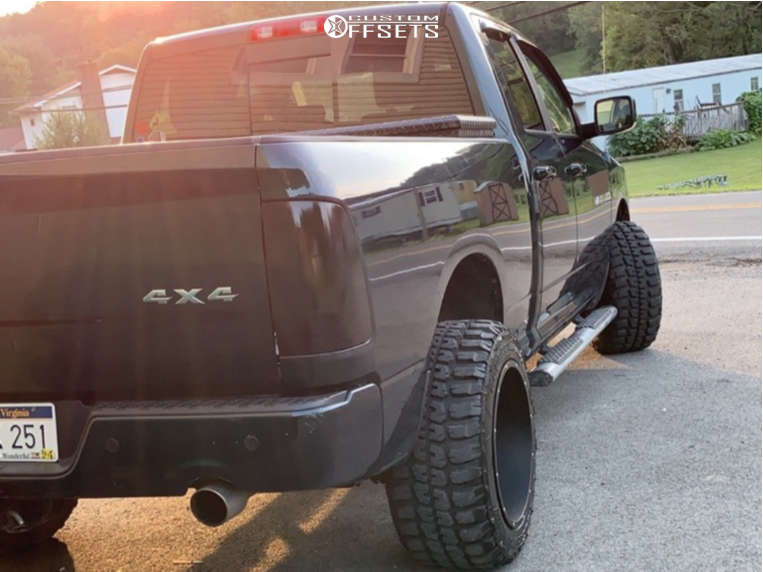 2011 Ram 1500 with 20x12 51 Vision Rocker and 33/12.5R20 Federal