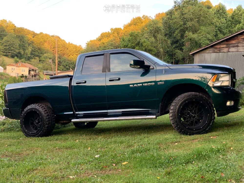 2011 Ram 1500 with 20x12 51 Vision Rocker and 33/12.5R20 Federal