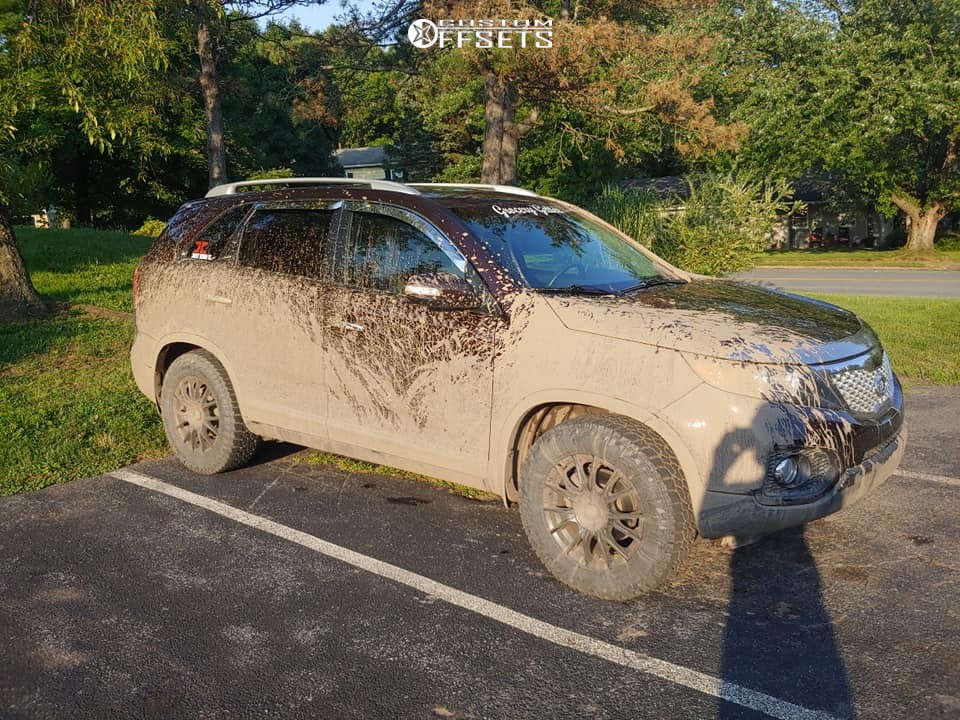 2013 Kia Sorento with 17x7.5 43 Platinum Marathon and 245/65R17 Falken Wildpeak At3w and Stock