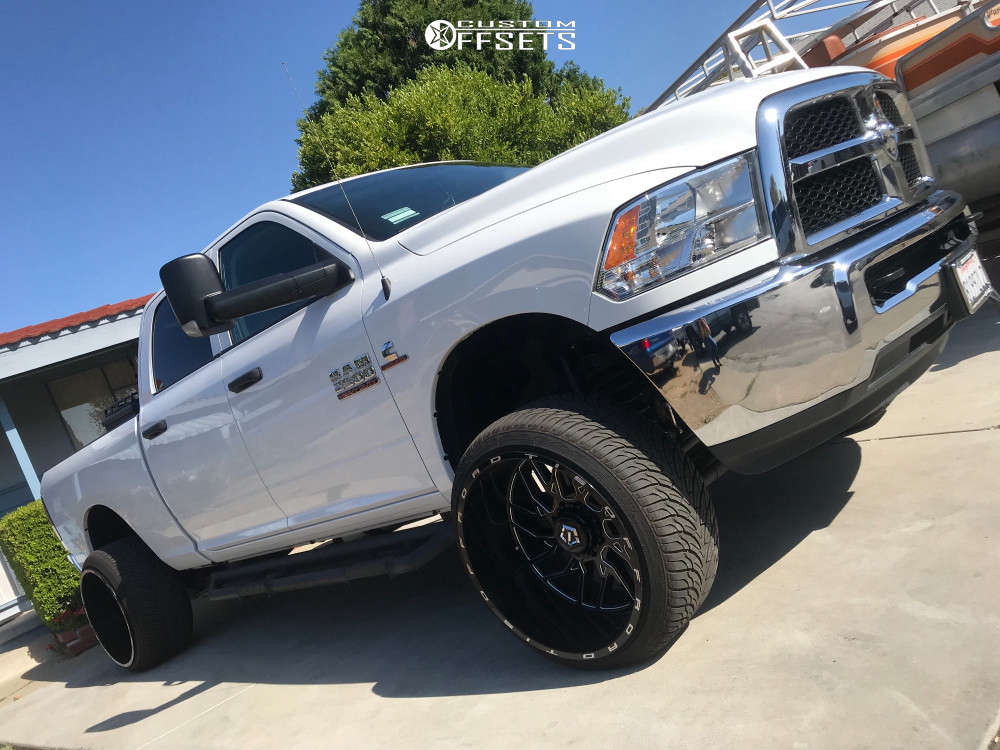 2018 Ram 2500 with 24x14 -76 TIS 544BM and 305/35R24 Atturo Az800 and ...