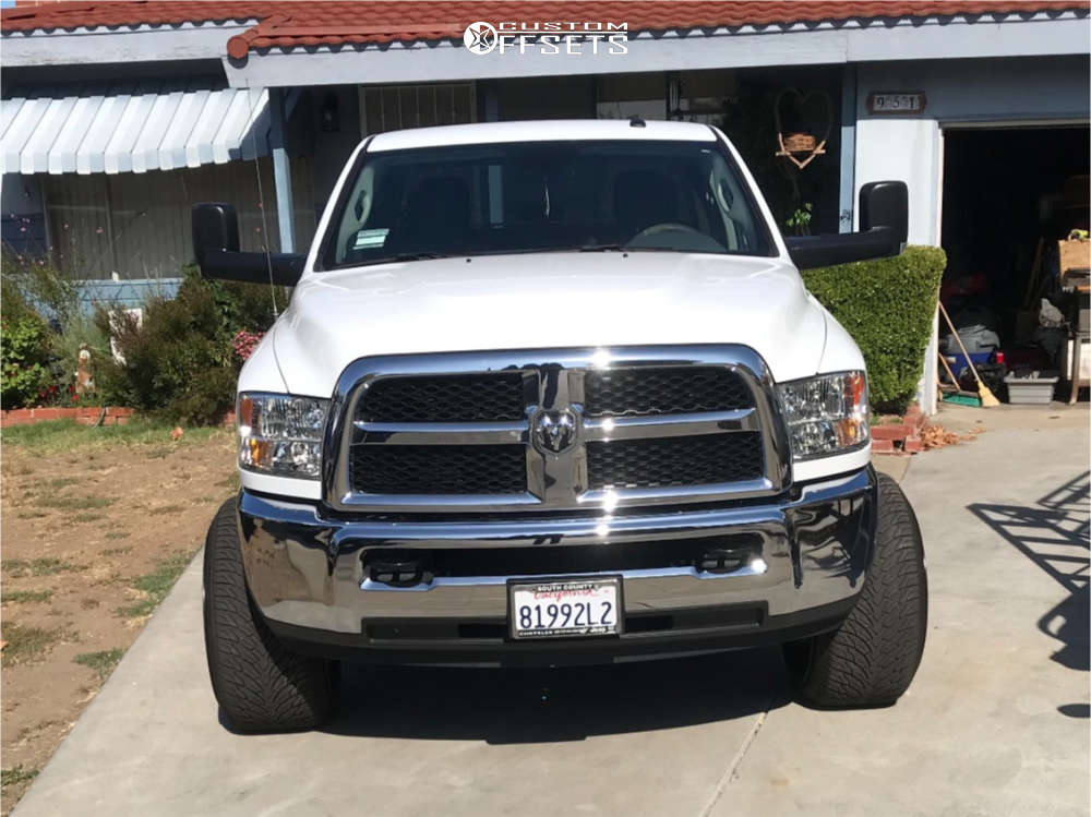 2018 Ram 2500 with 24x14 -76 TIS 544BM and 305/35R24 Atturo Az800 and ...