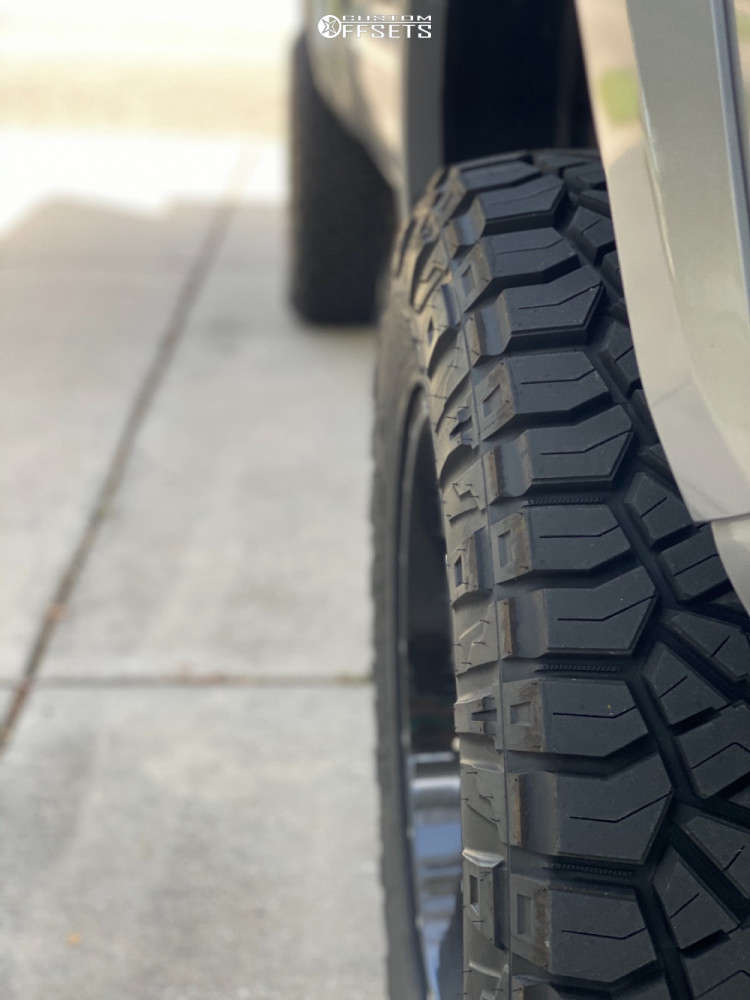 2019 Toyota Tacoma with 18x9 -12 Ultra Hunter and 285/65R18 Nitto Ridge ...