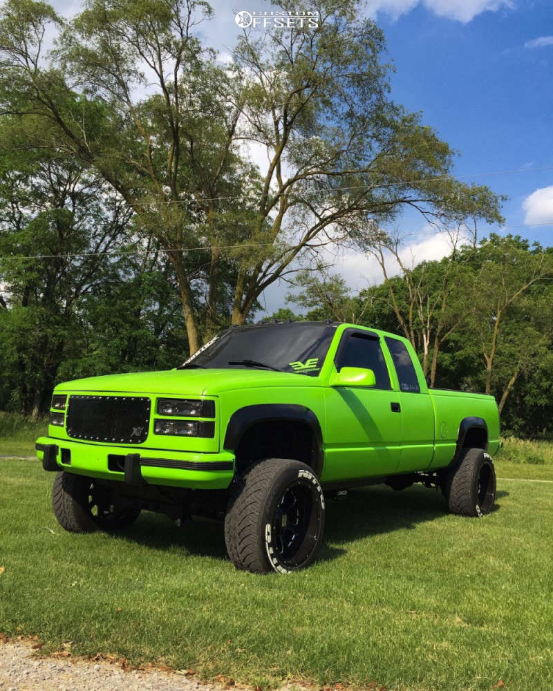1997 Chevrolet K2500 with 20x12 44 XD Xd825 and 305/50R20 Nitto NT420V