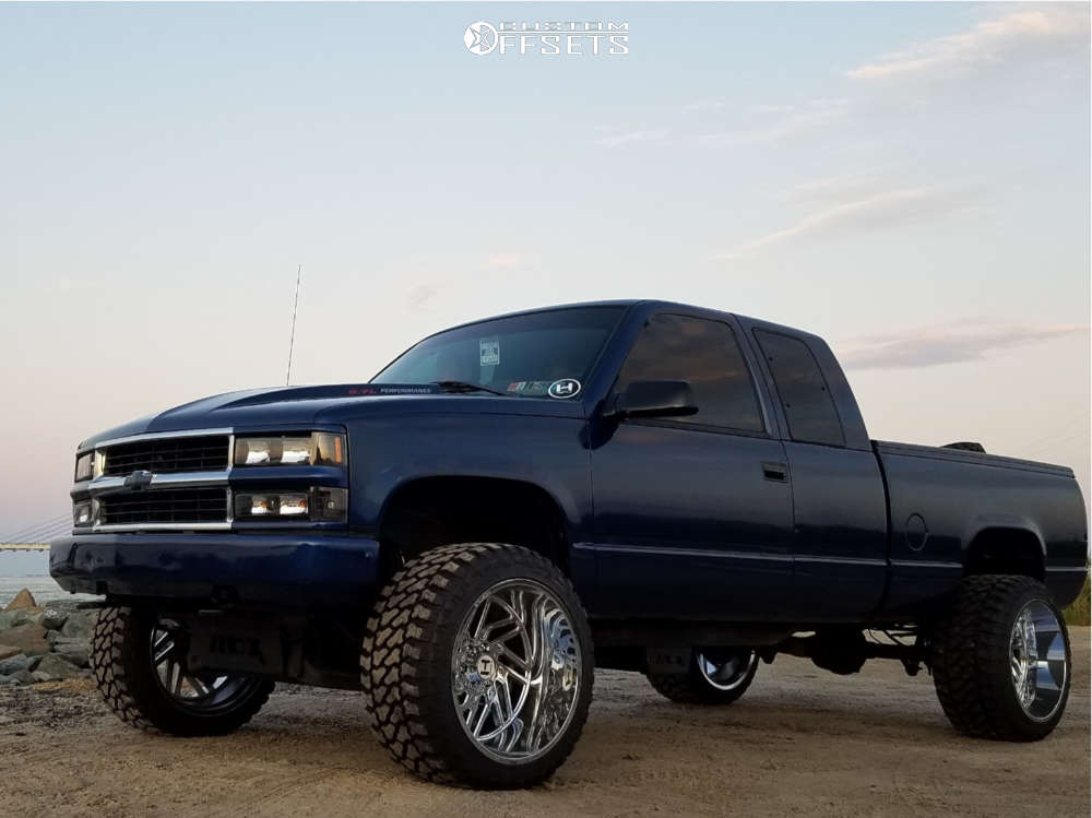 1997 Chevrolet K1500 with 22x14 -76 Hostile Jigsaw and 33/14.5R22