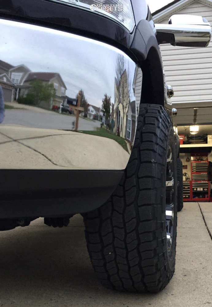 2018 Ram 2500 with 18x10 12 RBP 94R and 295/70R18 Cooper Discoverer