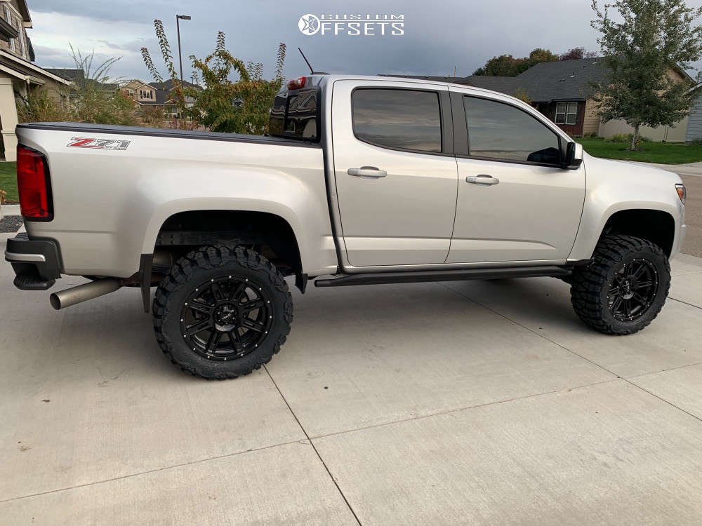 2017 Chevrolet Colorado with 20x9 0 Helo He900 and 33/12.5R20 Nitto Mud