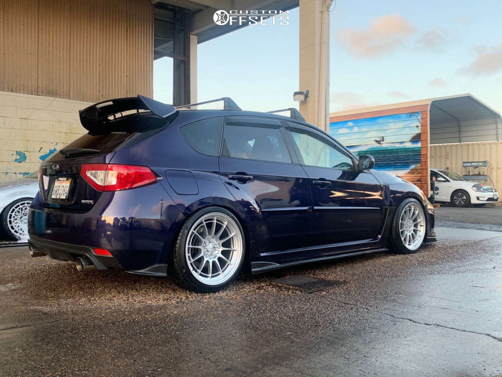 2012 Subaru Impreza with 18x9.5 40 Enkei NT03M and 245/35R18