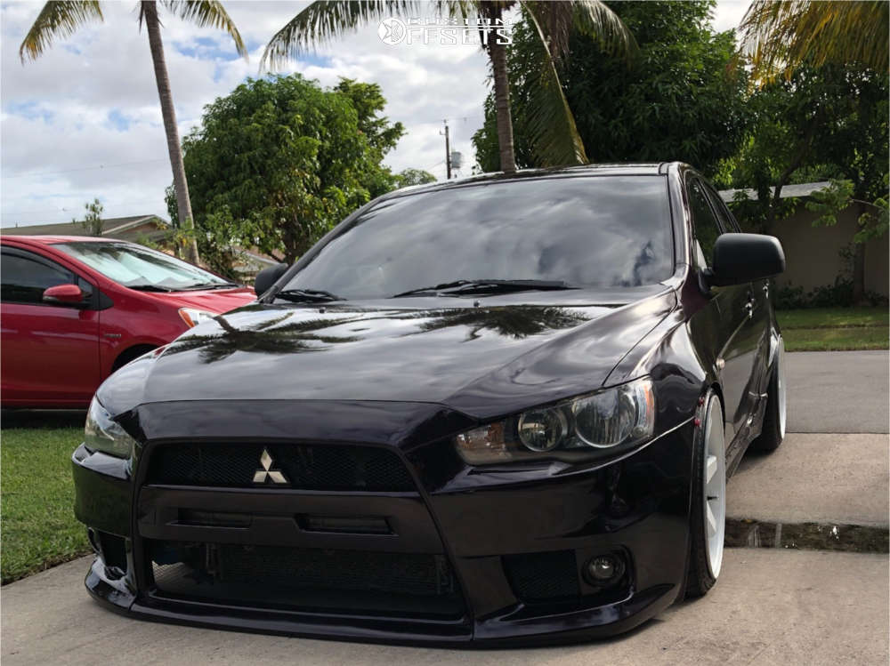 2009 Mitsubishi Lancer with 19x9.5 22 ESR Sr07 and 225/30R19