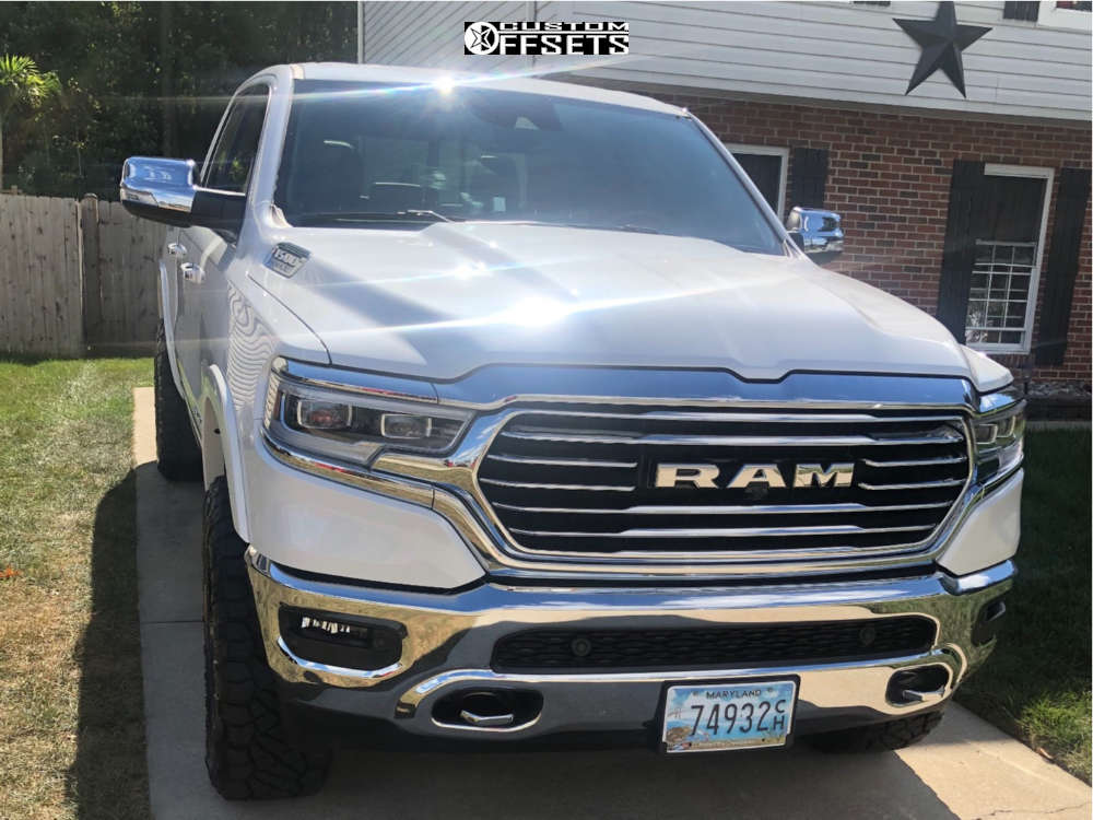2019 Ram 1500 with 20x10 18 Fuel Assault D246 and 35/11.5R20 Nitto