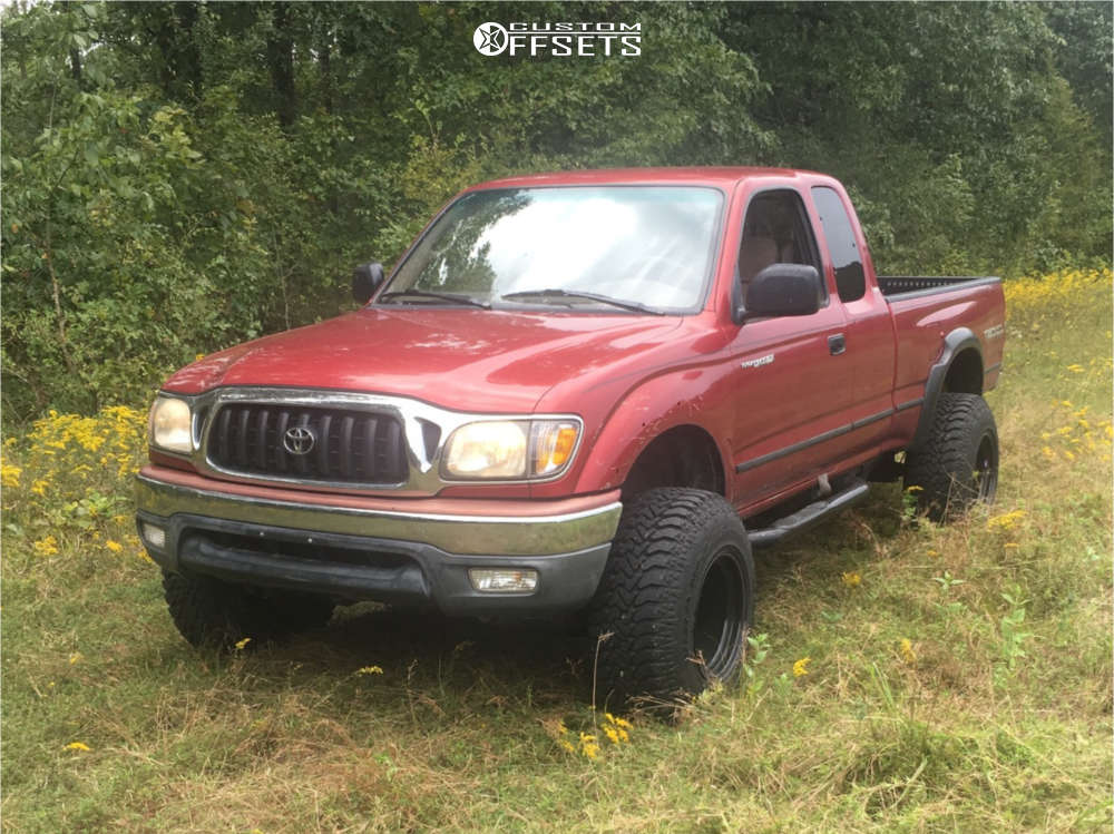 2002 Toyota with 15x12 81 Bart Wheels Super Trucker and 31/10