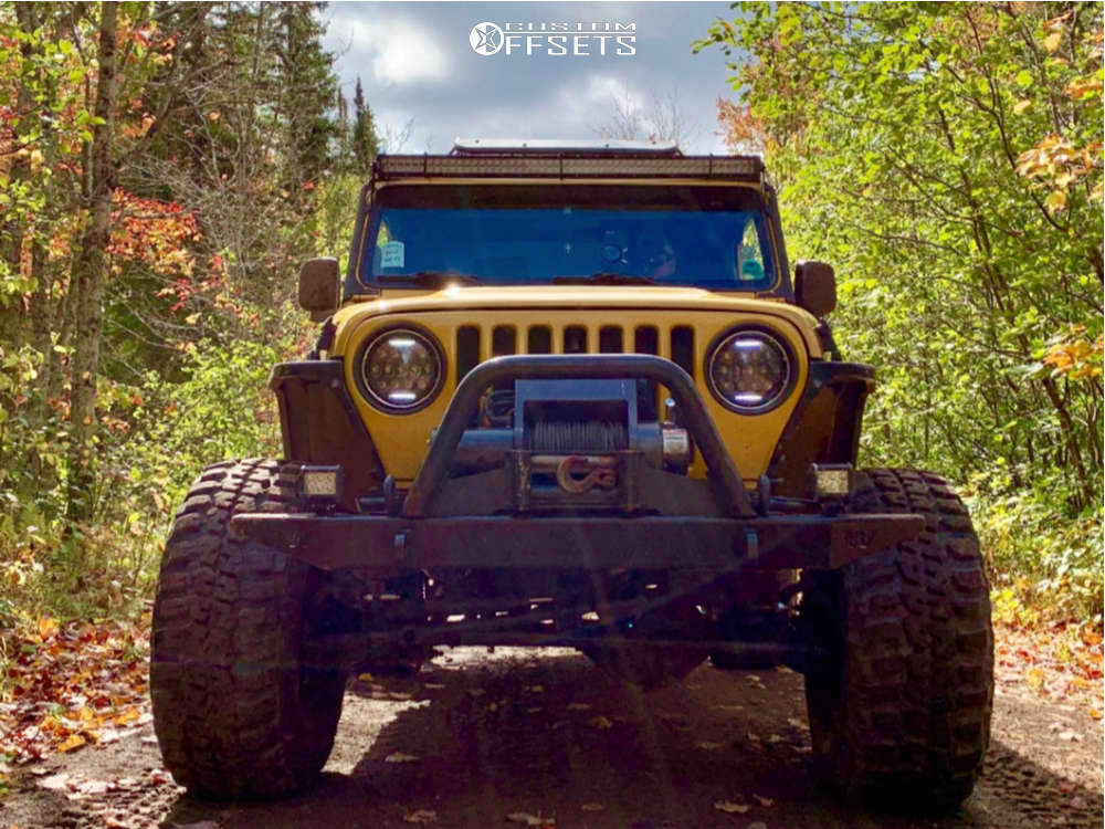 2003 Jeep TJ with 15x10 43 American Racing Baja and 35/12.5R15 Federal
