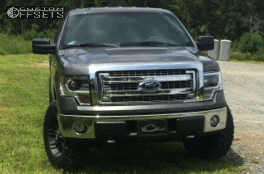 2014 Ford F150 with 18x9 14 Fuel Octane and 275/70R18 Toyo Tires Open