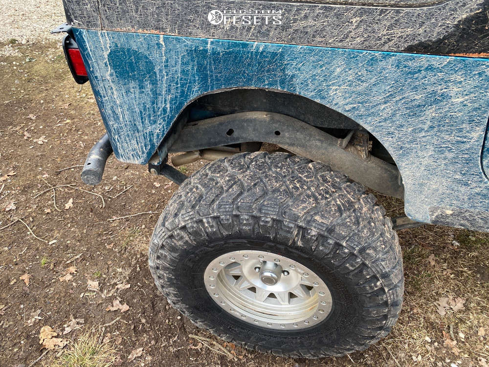1995 Jeep Wrangler with 17x9 14 Dirty Life Roadkill Race and 37/12