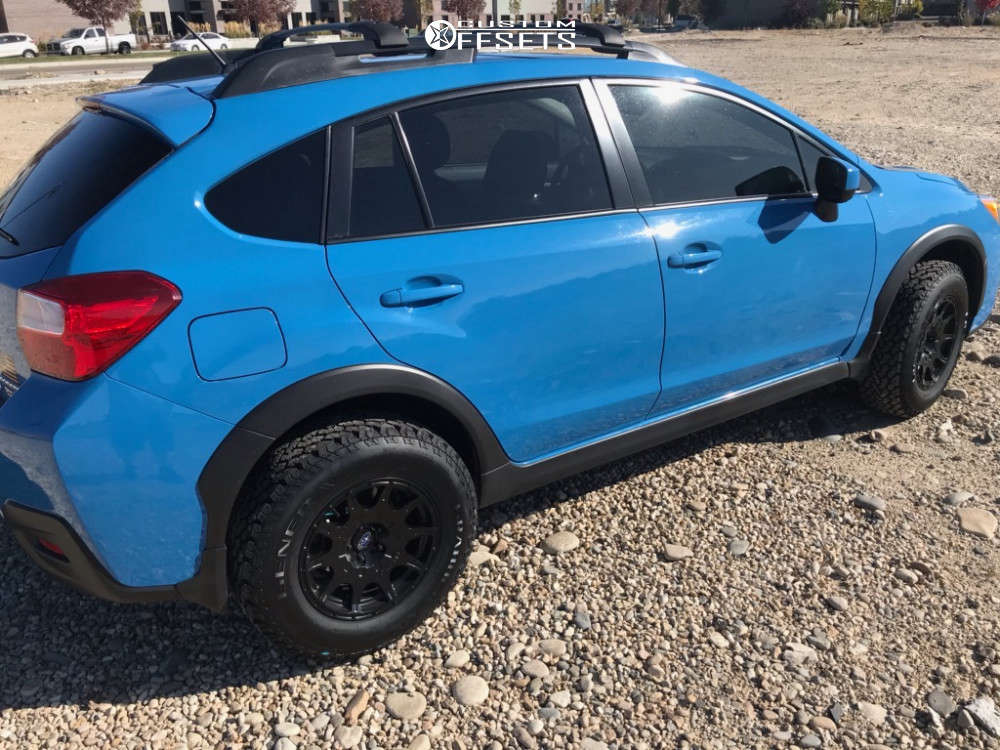 2016 Subaru Crosstrek with 15x7 15 Method Mr502 and 215/75R15 General ...