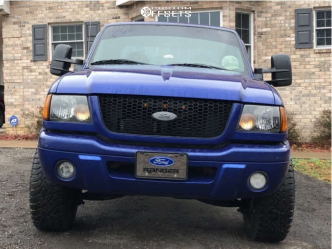 2003 Ford Ranger with 15x8 -27 Alloy Ion 174 and 31/10.5R15 Goodyear ...