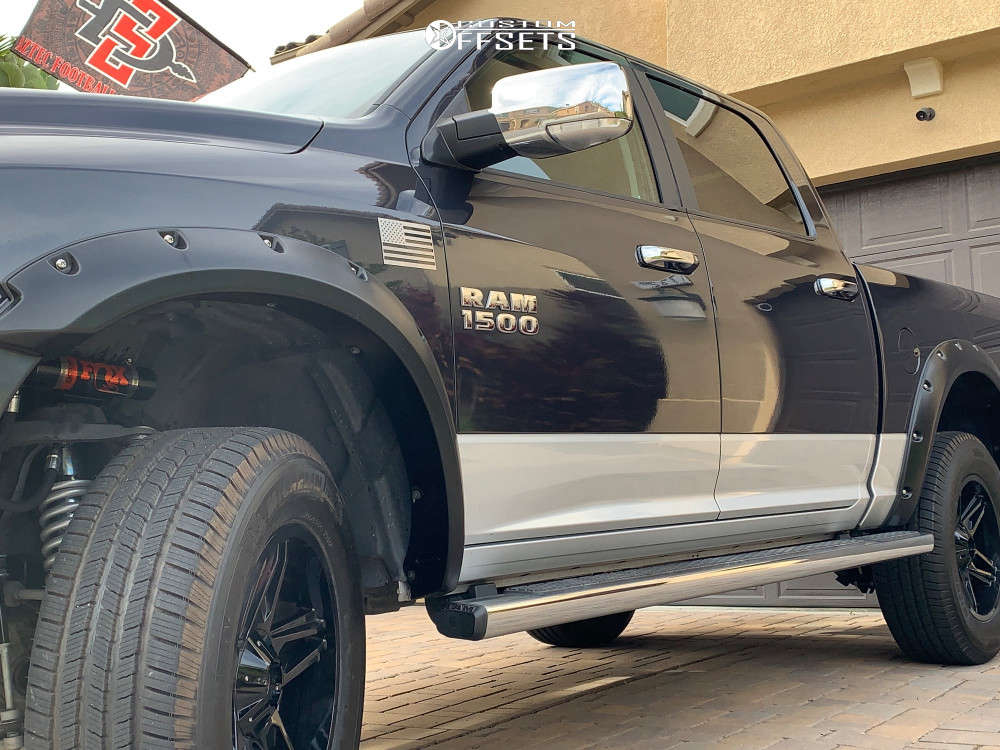 2016 Ram 1500 with 20x9 10 American Outlaw Lonestar and 295/65R20 ...