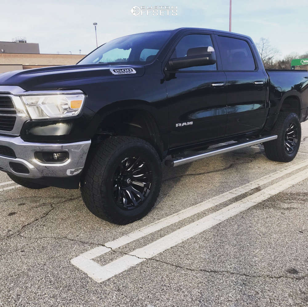 2019 Ram 1500 with 20x10 18 Fuel Blitz and 35/12.5R20 Nitto Terra