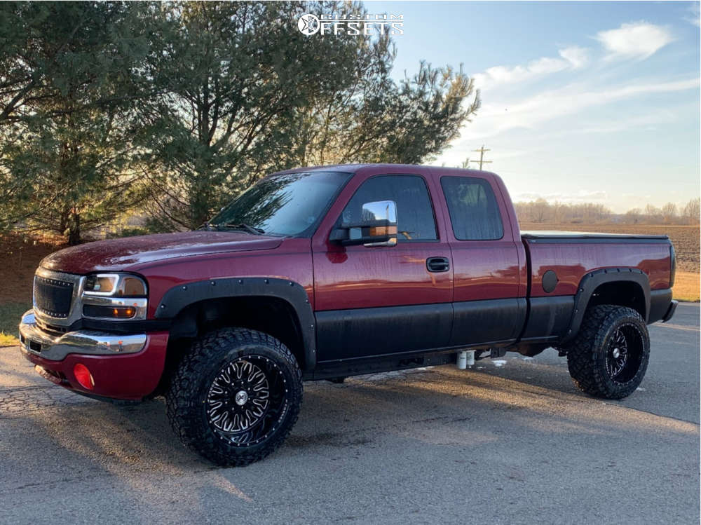 2004 GMC Sierra 2500 HD with 20x12 44 XF XFX305 and 33/12.5R20