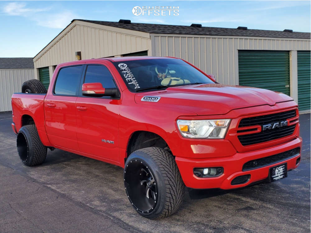 2019 Ram 1500 with 22x14 76 Hardrock Devious and 305/40R22 Toyo Tires