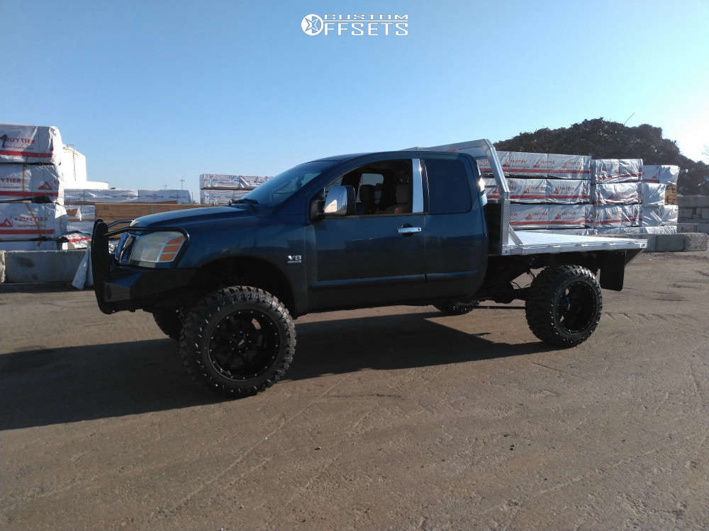 2004 Nissan Titan with 20x12 -44 Moto Metal Mo970 and 325/60R20 Atturo
