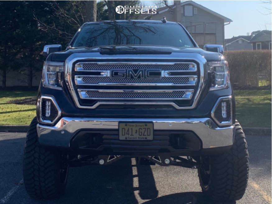 2019 GMC Sierra 1500 with 24x14 76 Hostile Jigsaw and 37/13.5R24 AMP