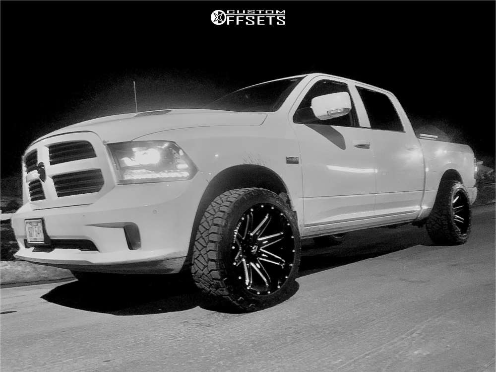 2015 Ram 1500 with 22x12 44 Hardrock Painkiller Xposed and 33/12.5R22 Nitto Ridge Grappler and