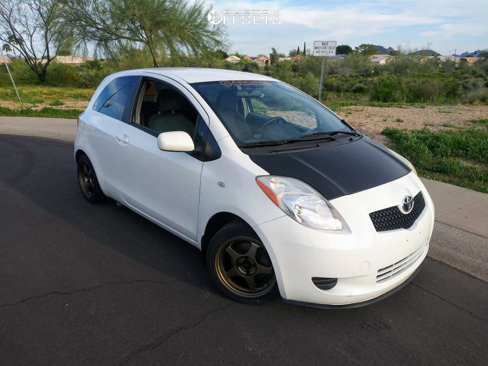 2008 Toyota Yaris with 15x6.5 35 AVID1 AV8 and 195/45R15 Toyo Tires