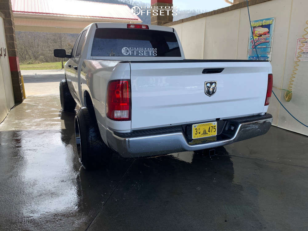 2019 Ram 1500 with 22x14 76 Anthem OffRoad Equalizer and 305/45R22 Nitto NT420V and Leveling