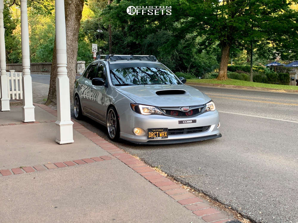 2008 Subaru Impreza with 18x8.5 35 Aodhan Ah08 and 215/35R18