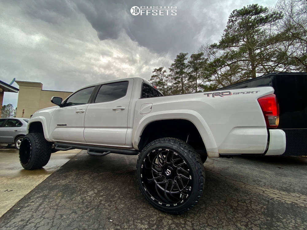 2016 Toyota Tacoma with 22x14 -76 TIS 544BM and 33/12.5R22 Venom