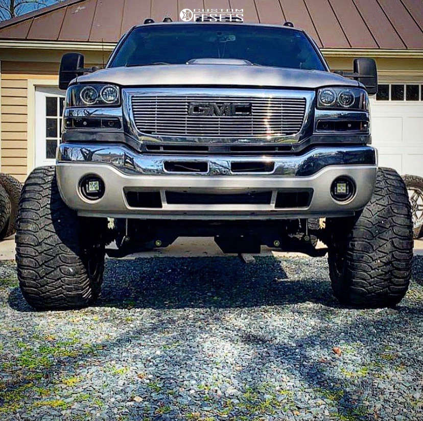 2004 GMC Sierra 2500 HD with 20x14 76 Fuel Hostage and 38/15.5R20