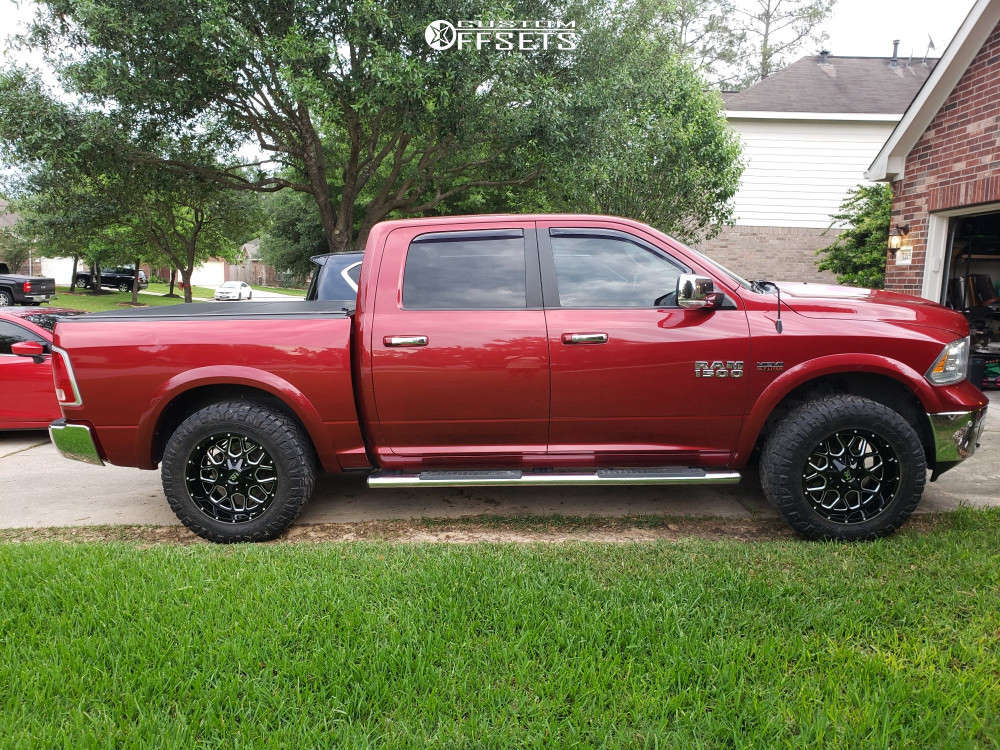 2014 Ram 1500 with 20x10 -19 Hardrock Gunner and 295/65R20 Nitto Ridge ...