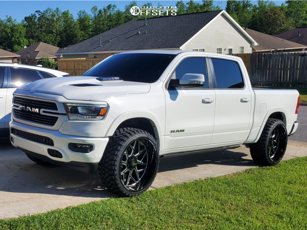 2021 Ram 1500 with 26x12 -44 Axe Offroad Nemesis and 35/13.5R26