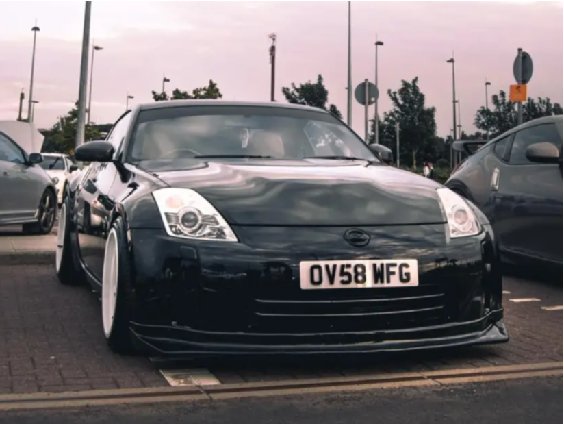 2008 Nissan 350Z with 18x9 30 Cosmis Racing Xt-006r and 225/40R18