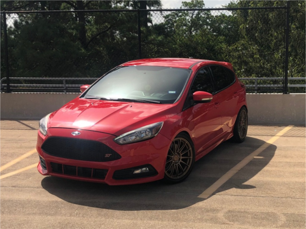 2015 Ford Focus with 18x8.5 42 Motegi Mr148 and 245/40R18 Falken