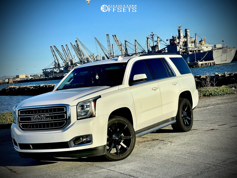 2016 GMC Yukon with 22x10 30 KMC Slide and 305/40R22 General Uhp