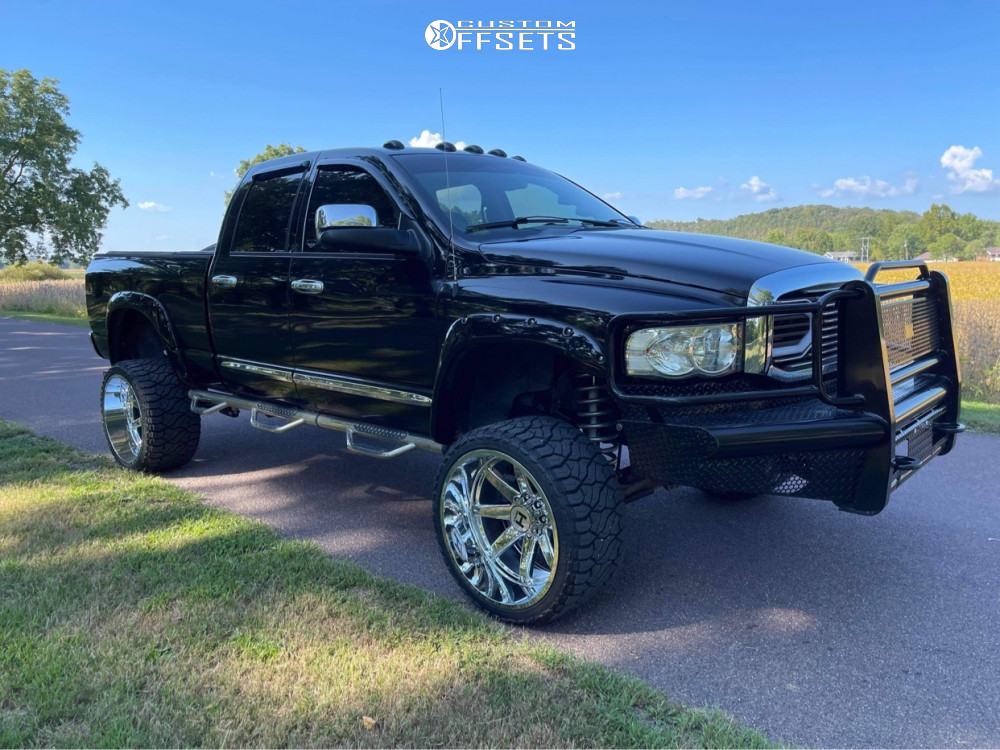 2005 Dodge Ram 2500 with 24x14 -76 Hostile Sprocket and 33/14.5R24