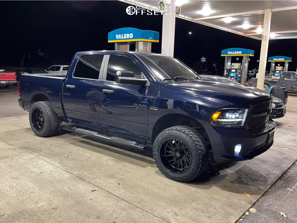 2014 Ram 1500 with 20x12 -44 TIS 547B and 33/12.5R20 Venom Power