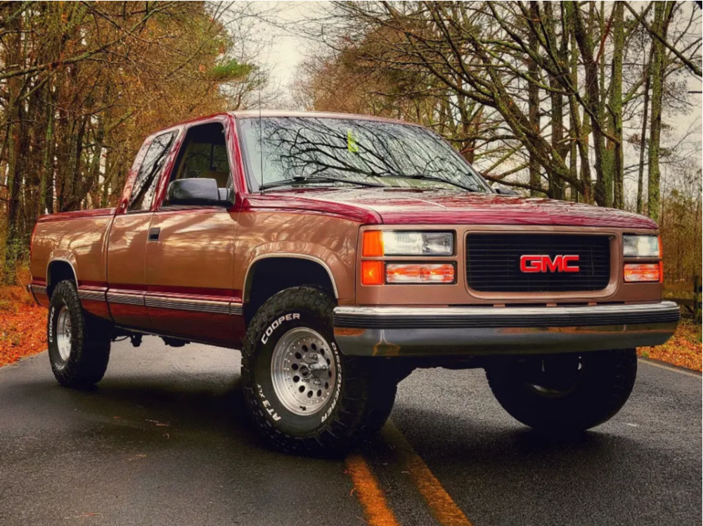 1995 GMC C1500 with 15x7 -6 American Racing Outlaw Ii and 33/12.5