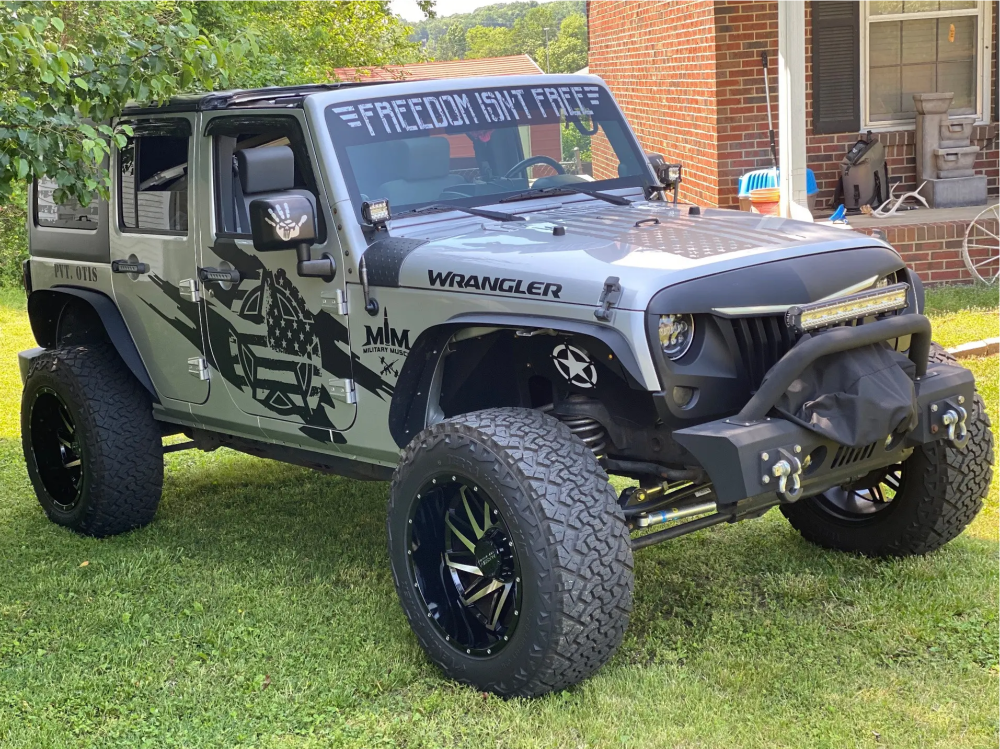 2009 Jeep Wrangler with 20x12 -44 Massiv Offroad Or3 and 35/12.5