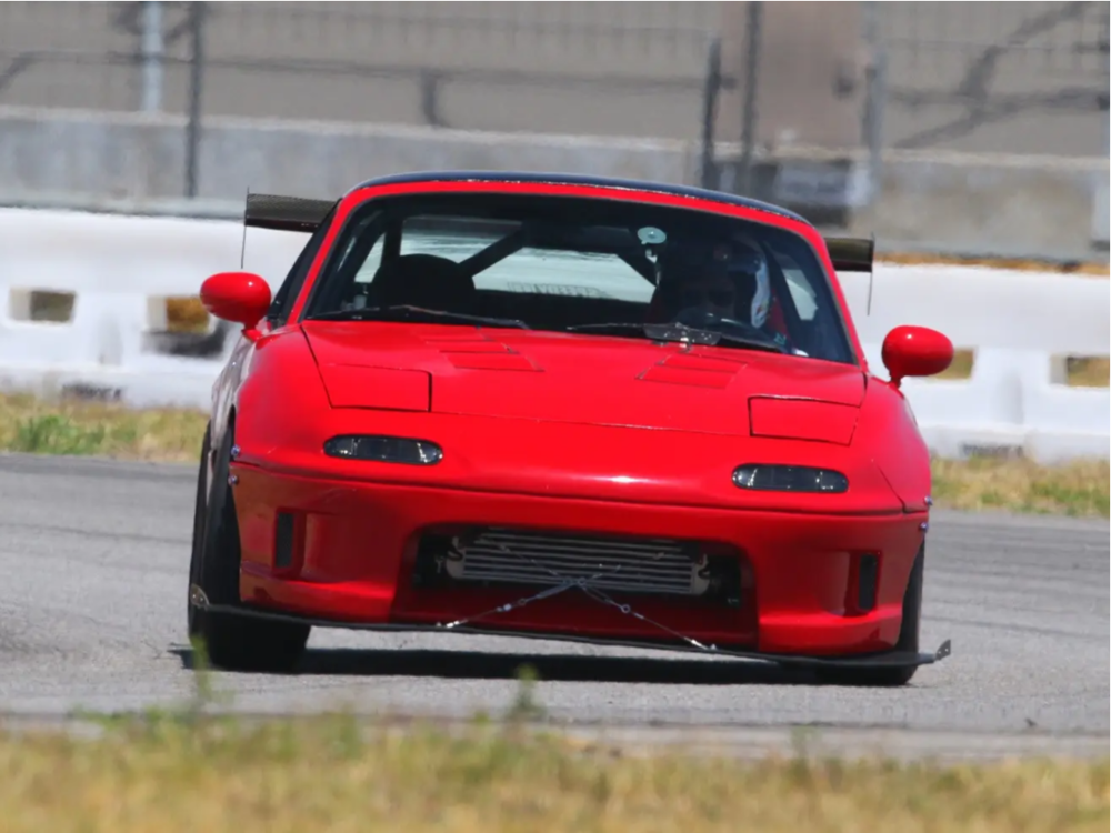 1991 Mazda Miata with 15x8 25 Konig Hexaform and 205/50R15 Falken