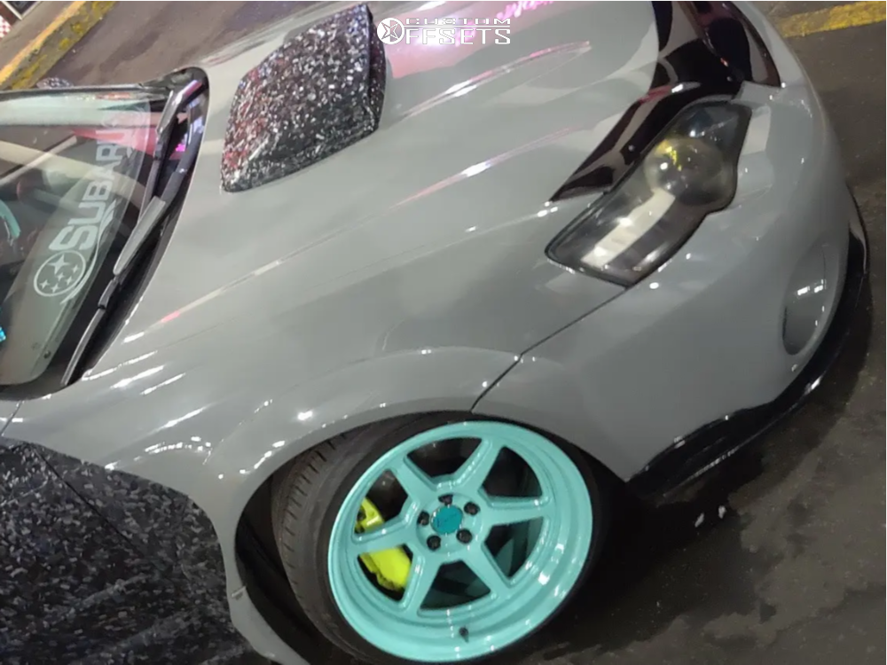 2005 Subaru Outback with 18x10.5 12 Kansei Roku and 225/35R18