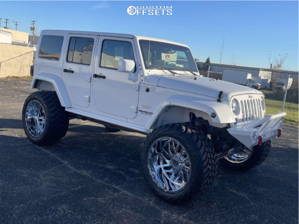 2015 Jeep Wrangler with 24x14 -76 TIS 544C and 38/15.5R24 AMP Mud