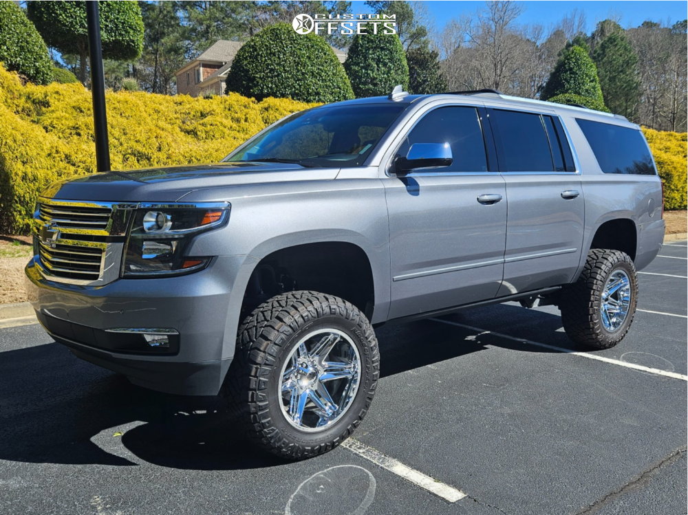 2019 Chevrolet Suburban with 20x10 -25 Vision Razor and 35/12.5R20