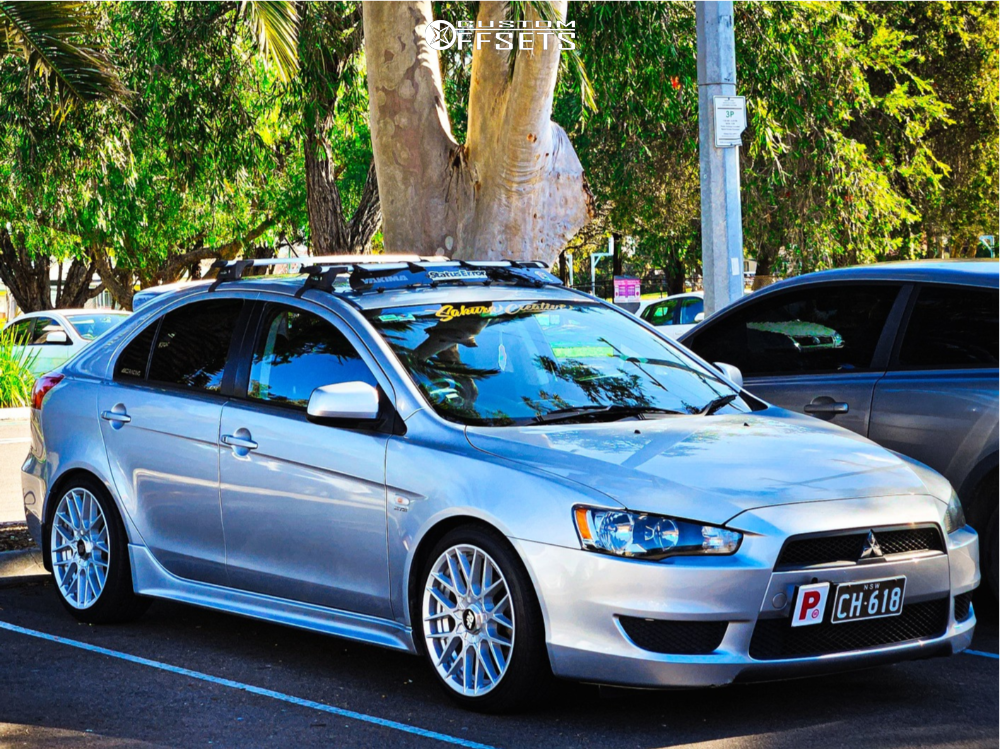 2010 Mitsubishi Lancer with 18x8.5 35 Rotiform Rse and 225/40R18